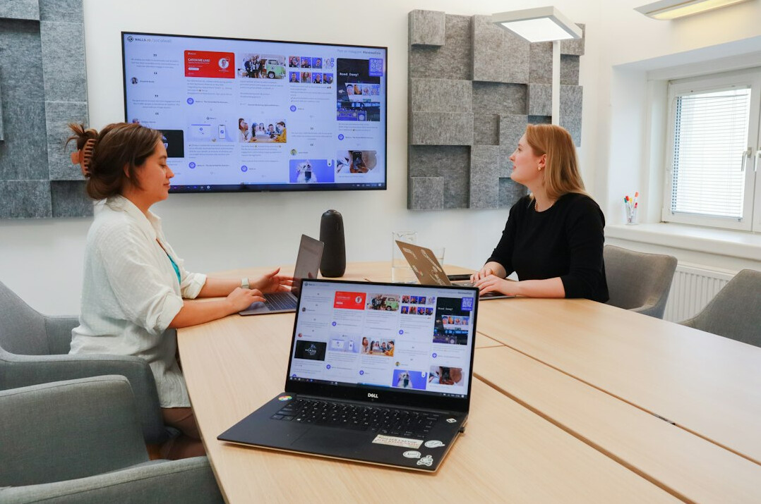 Bright conference room with long table and chairs