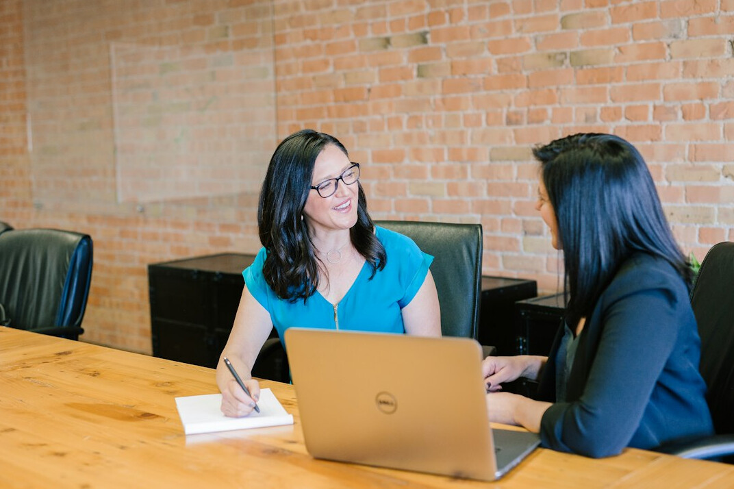 woman leading team meeting